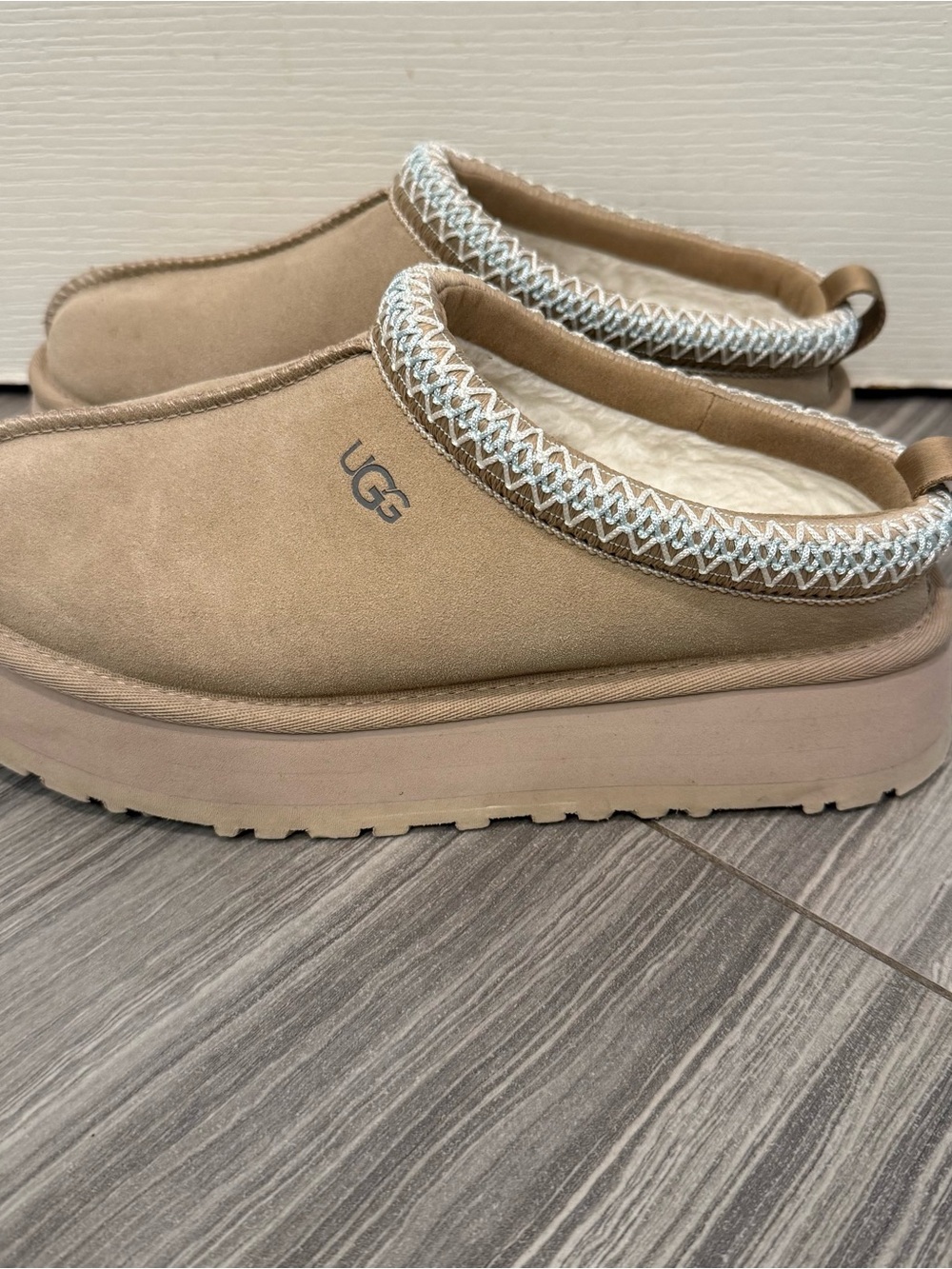 UGG Women’s tazz II Suede Platform slipper in sand.